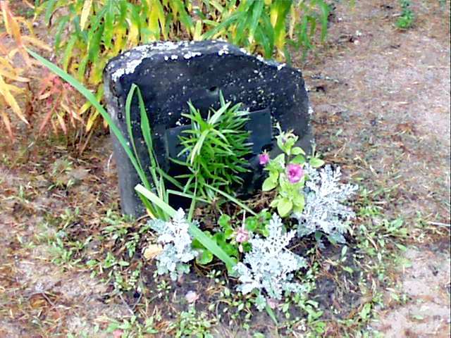 Kustin hautakivi Piehingissä